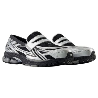حذاء نيو بالانس 1906L بدون كعب، لون فضي معدني أسود