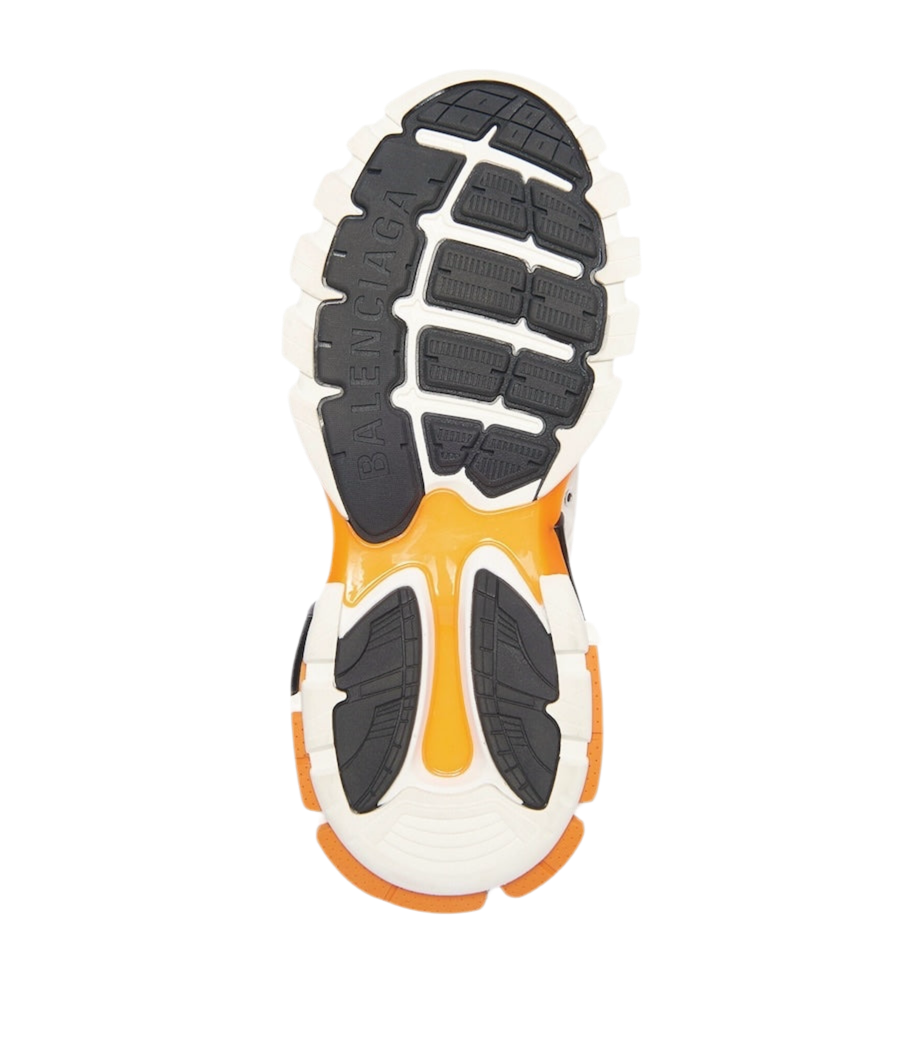 حذاء رياضي بالنسياغا تراك باللونين الأبيض والبرتقالي