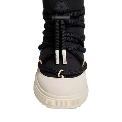 حذاء مونكلير مونبولس ذو الرقبة القصيرة المبطنة باللونين الأسود والأبيض